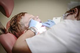 child with dentist