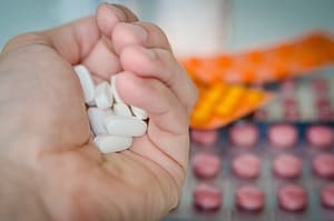 holding many pills